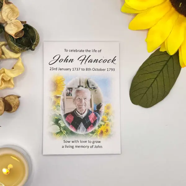 Single white envelope showing custom design featuring image of loved one