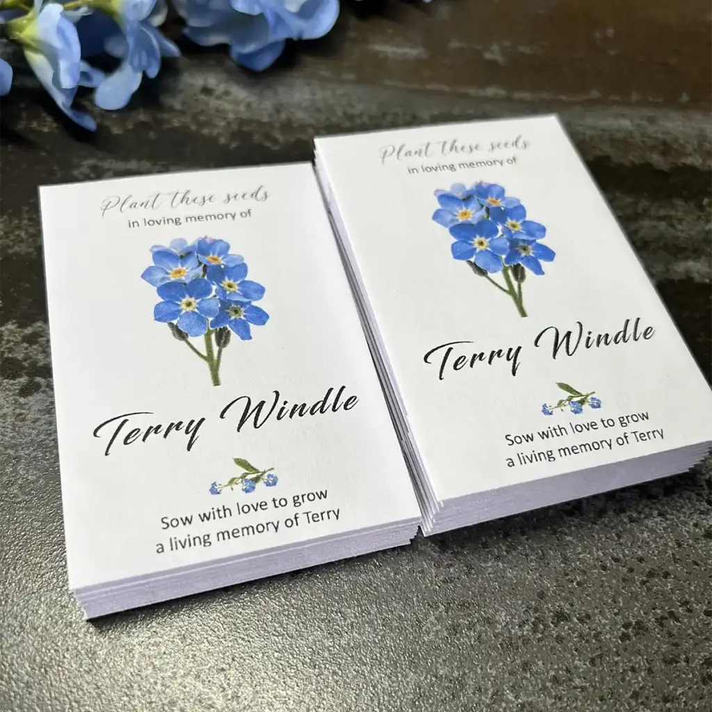 Forget me not flowers for funeral personalised and printed on white paper envelope