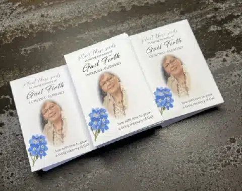 Personalised white envelopes using a forget me not design and a loved one's picture