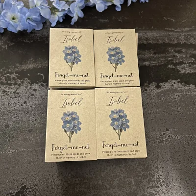 Forget me not flowers for funeral personalised and printed on brown paper envelope