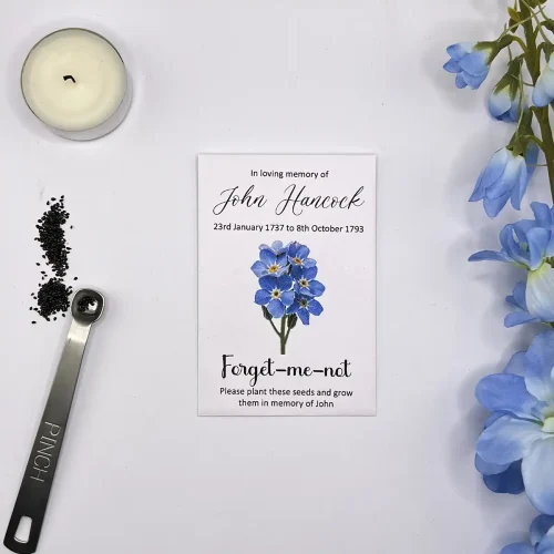 Forget me not funeral seeds flowers design on white paper envelope